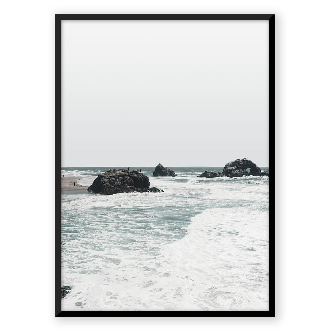 Ocean waves and rocks.
