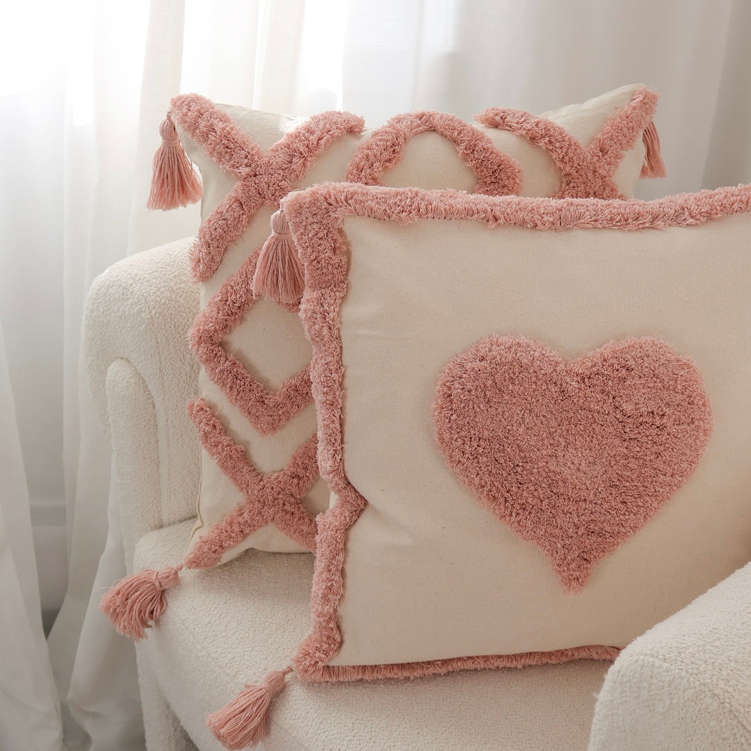 Pastel pink and mustard yellow tufted cushion covers for home décor