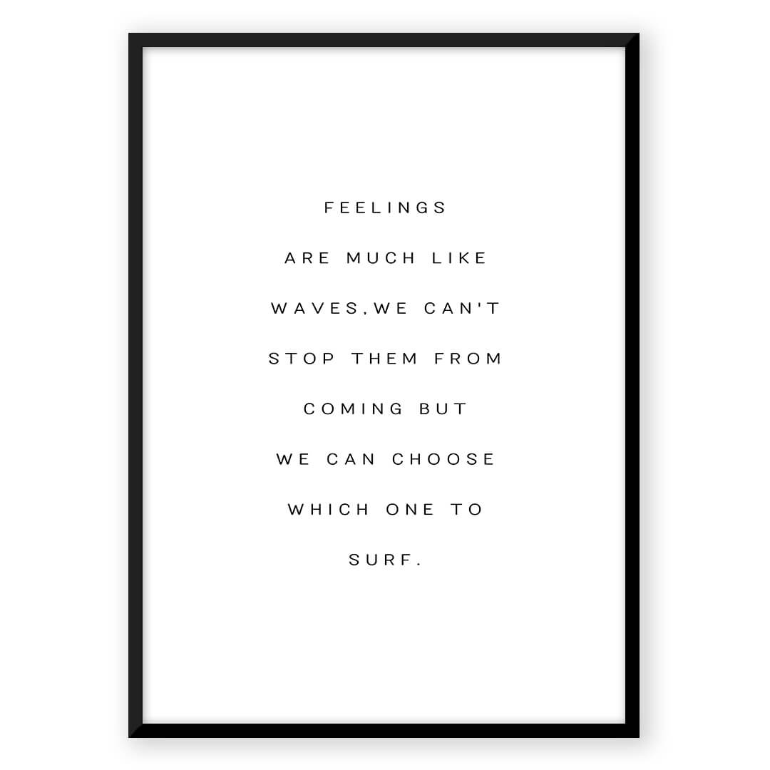 Black framed poster with inspirational quote.
