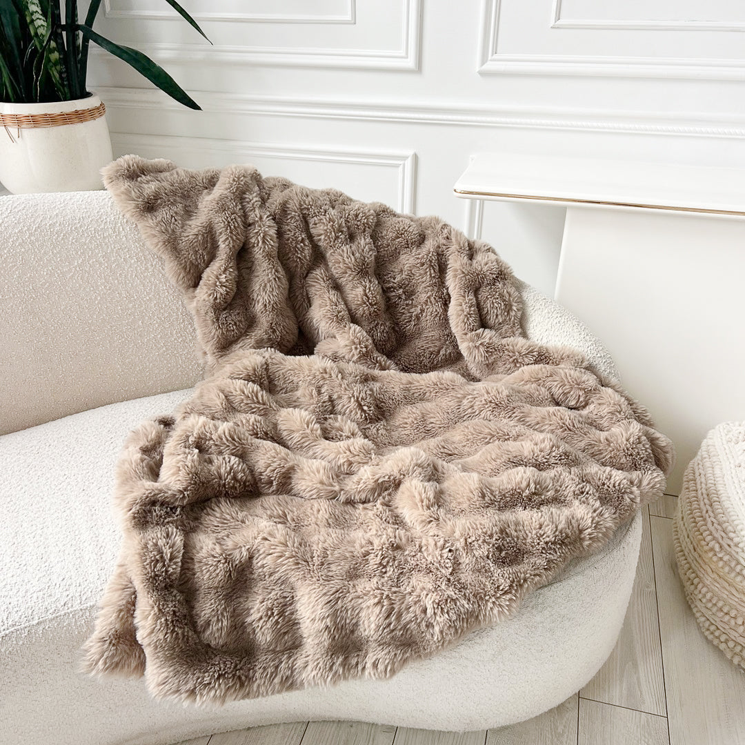 Faux fur throw blanket draped over a couch, IMG_3830-2